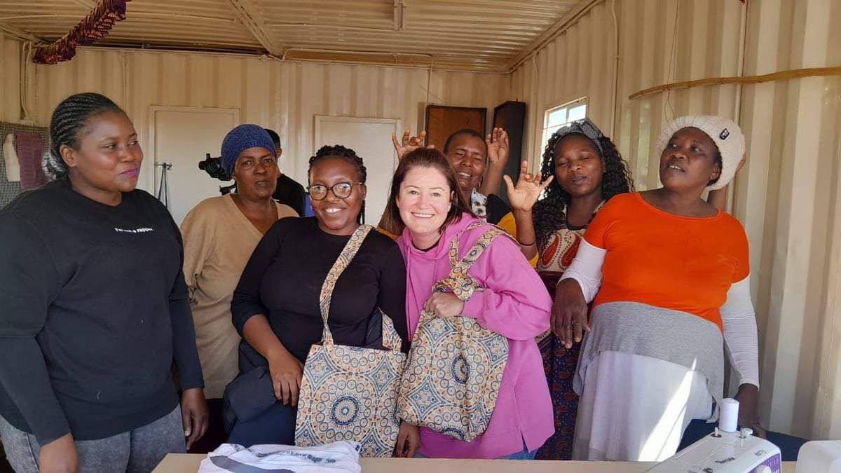 Africa -Showing off bags sewed at the Winnie Mabaso F_Charity Malahlela-1
